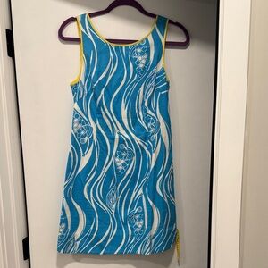 Blue and White Sleeveless Dress with Yellow Accents